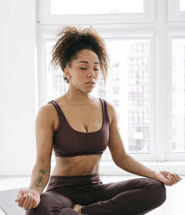 Beautiful woman in a serene pose focusing on visual relaxation exercises